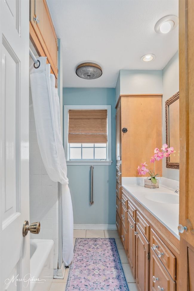 Full bathroom featuring tile patterned floors and vanity | Image 11