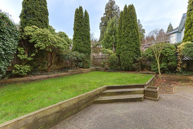 View of yard featuring a patio area and a fenced backyard | Image 38