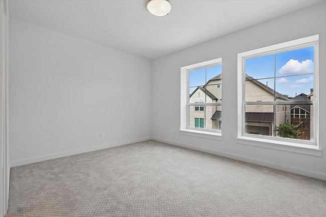 Carpeted empty room with baseboards | Image 30