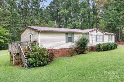 Side porch enters into laundry room | Image 3