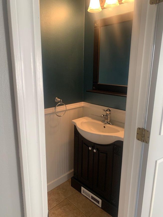 Half bath off foyer | Image 16