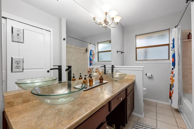 Primary bathroom with dual sinks and two large closets | Image 19