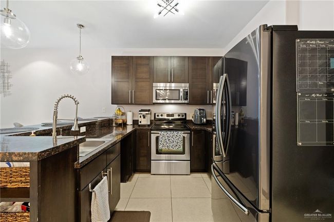 UNIT-203 - 813 Travis St, Condo with 3 bedrooms, 2 bathrooms and null parking in Mission TX | Image 9