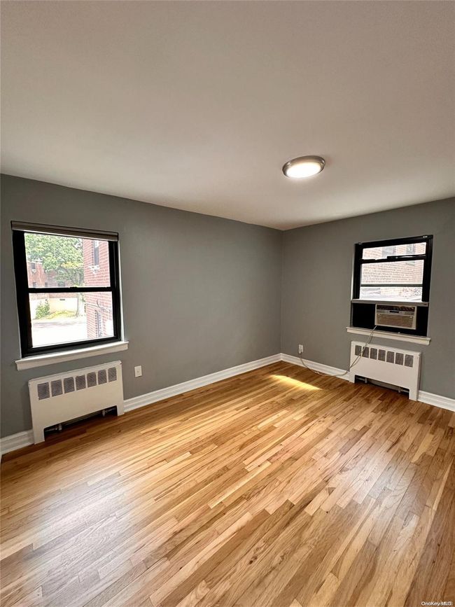 2 - 219-50 74 Th Ave, Home with 2 bedrooms, 1 bathrooms and 2 parking in Bayside NY | Image 9
