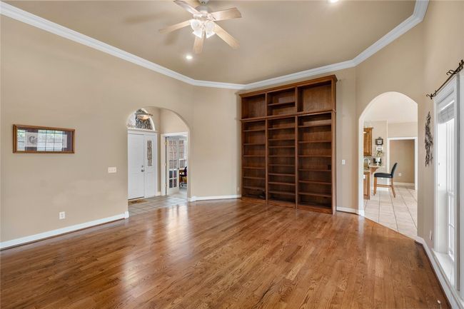 Custom built ins in living room floor to ceiling | Image 12