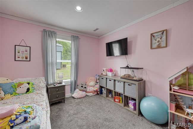 Rec room with carpet flooring, ornamental molding, and recessed lighting | Image 18