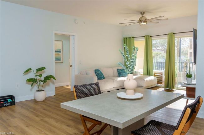 Sunroom with a ceiling fan | Image 6
