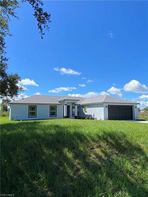 2613 72nd St W, Lehigh Acres, FL, 33971-5809 | Card Image