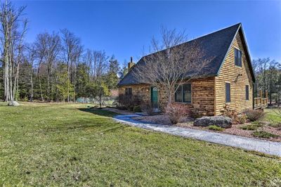 Front View of property exterior featuring a lawn | Image 1