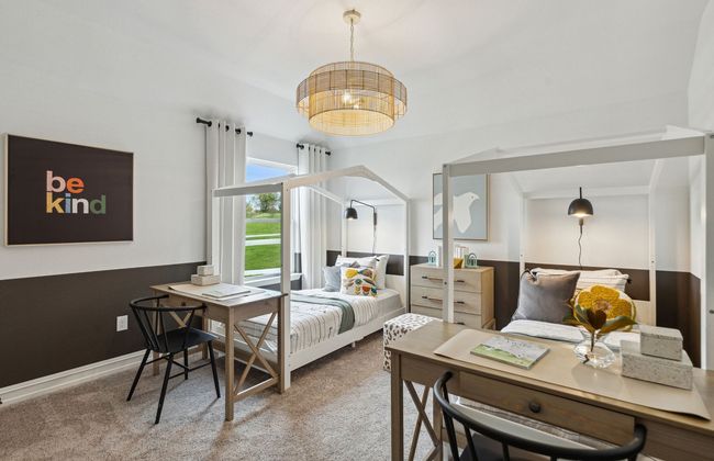 Spacious secondary bedroom with ample closet space *Photos of furnished model. Not actual home. Representative of floor plan. Some options and features may vary | Image 15