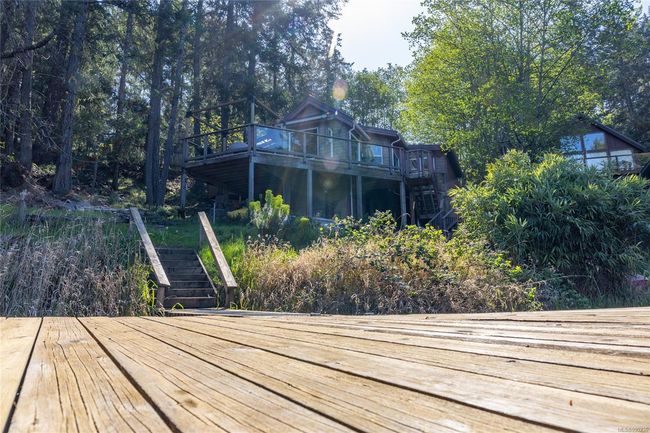 Wooden dock looking up at house | Image 38