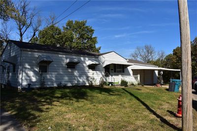 View of front facade with a front yard | Image 2