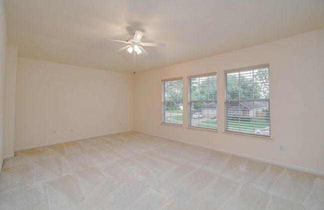 Upstairs space can be used as a gameroom, second living area, or children's play area. | Image 30