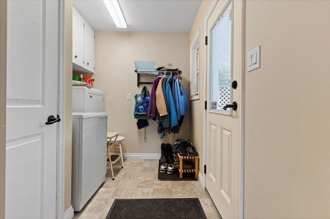 Mudroom featuring baseboards and washer / dryer | Image 30