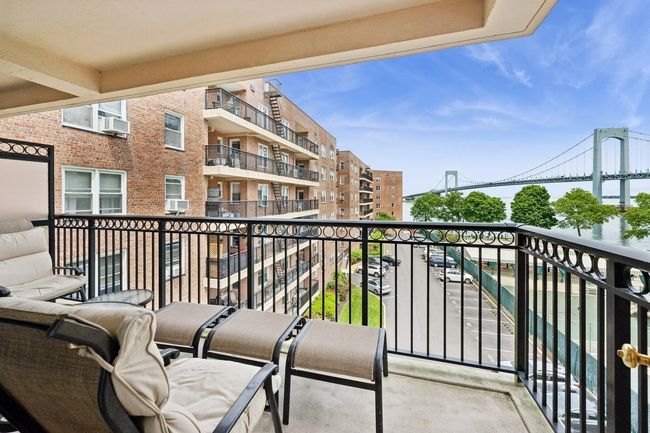 Balcony featuring a water view and cooling unit | Image 20