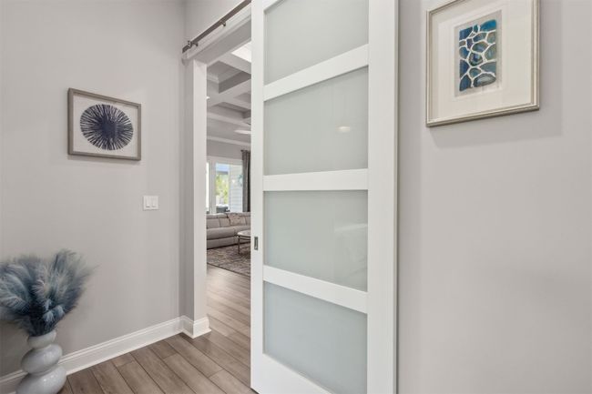 Designer barn doors in hallways add more privacy to guest bedrooms | Image 24