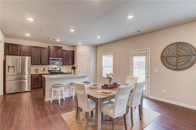 6841 Lancaster Xing, House other with 4 bedrooms, 3 bathrooms and 4 parking in Flowery Branch GA | Image 12