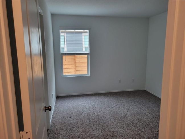 Unfurnished room with carpet flooring and baseboards | Image 21