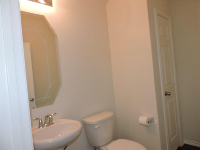 Half Bath with large storage closet | Image 9