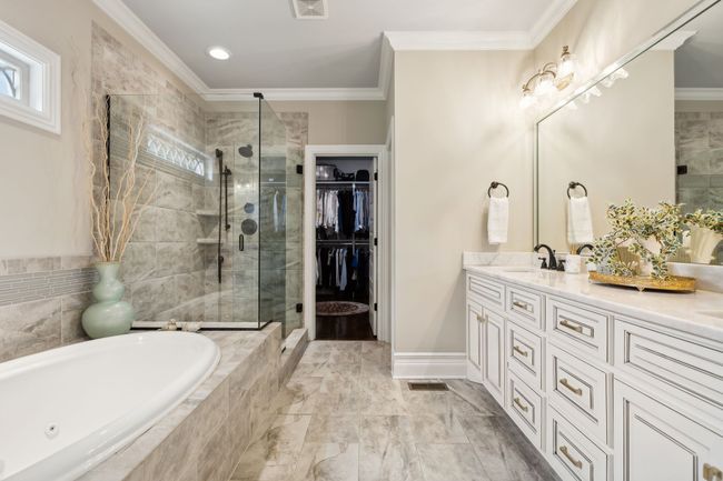 Owner's bath - Tile floors and frameless glass shower surround, and jetted garden tub... | Image 27