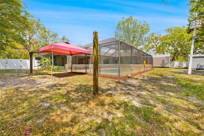 7660 Holiday Dr, House other with 4 bedrooms, 3 bathrooms and null parking in Spring Hill FL | Image 17
