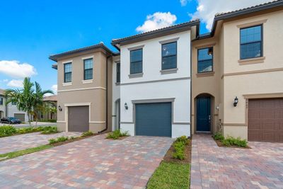 8667 Escue Street, Townhouse with 3 bedrooms, 2 bathrooms and null parking in Lake Worth FL | Image 1