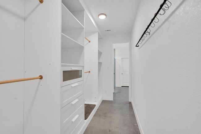 View of spacious closet | Image 33