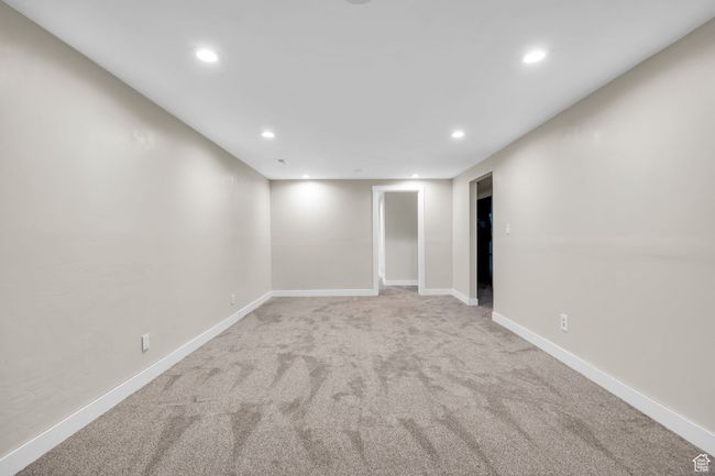 Finished below grade area featuring recessed lighting, carpet flooring, and baseboards | Image 21