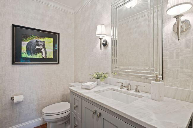 Lovely updated powder room | Image 13
