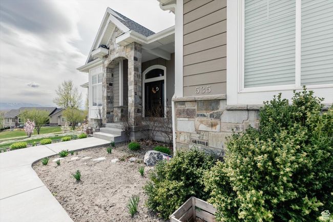 Entrance to property with stone siding | Image 23