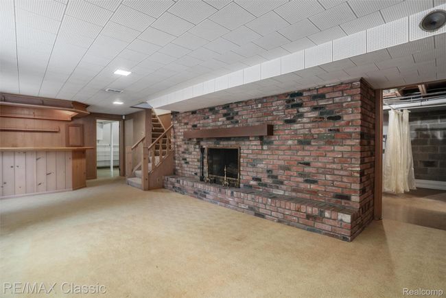 Basement recreation room natural fireplace | Image 28