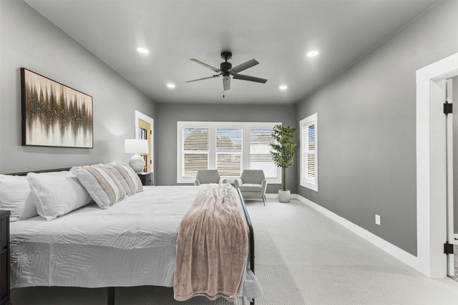 Bedroom featuring carpet flooring, recessed lighting, ceiling fan, and baseboards | Image 33