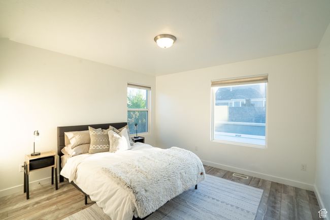 Bedroom 2 with wood finished floors | Image 25