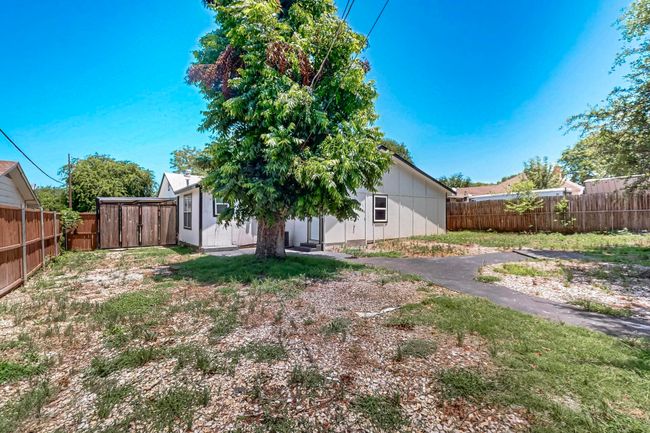 Rear view of property with a fenced backyard | Image 33