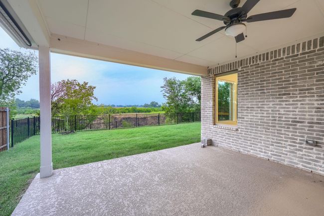 View of patio with a ceiling fan | Image 27