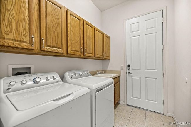 Laundry leading to Garage | Image 33