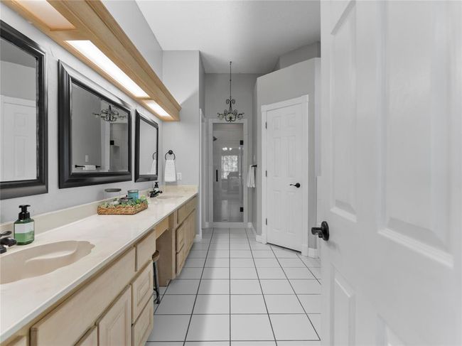 Freshly painted and updated primary bath | Image 16