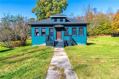 Bungalow-style home featuring a front lawn | Image 1