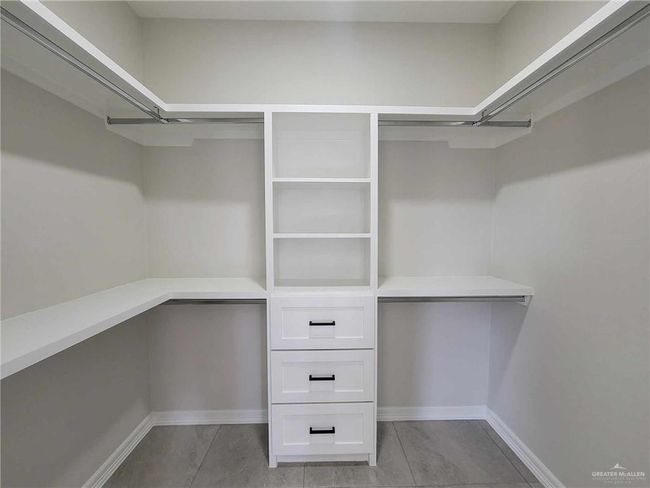 View of walk in closet | Image 16