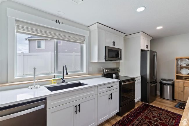 6 - 1015 W 3000 N N, House other with 4 bedrooms, 3 bathrooms and 2 parking in Pleasant View UT | Image 19
