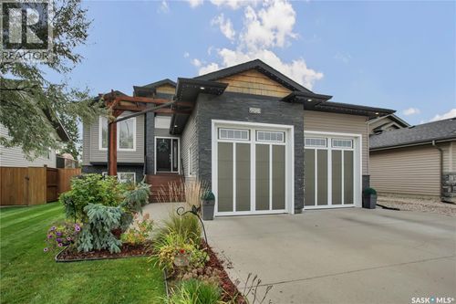 908 Hamm Terr, House with 4 bedrooms, 3 bathrooms and null parking in Martensville SK | Card Image