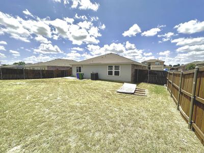 Rear view of house featuring a yard | Image 2