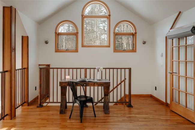 Living area with vaulted ceiling and light hardwood / wood-style floors | Image 18