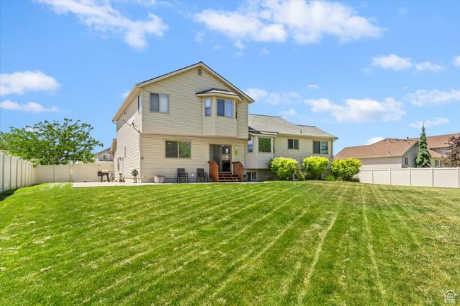 Rear view of property with a patio | Image 23