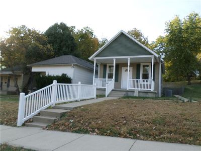 Bungalow-style house with central AC and covered porch | Image 1