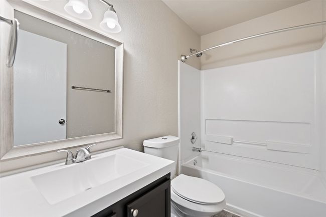 Full bath featuring vanity and shower combination | Image 13