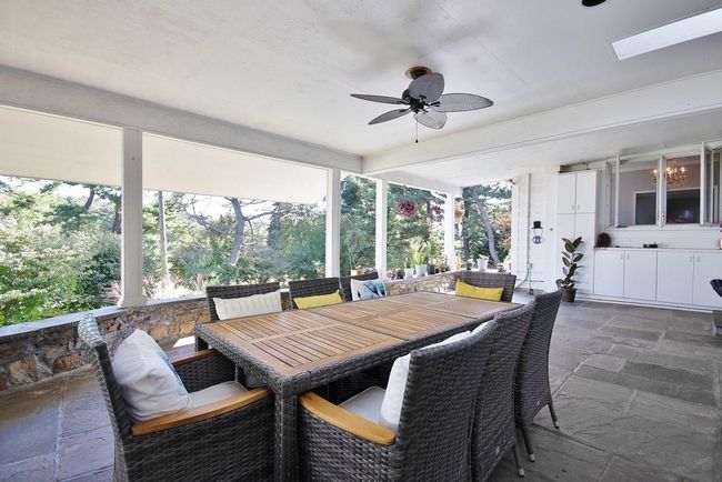 Covered Patio has ceiling fan | Image 26