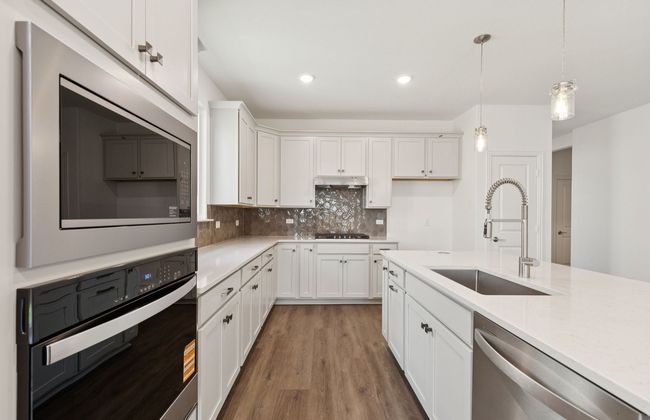 Roomy kitchen designed for functionality and comfort, with plenty of workspace *Real home pictured | Image 5