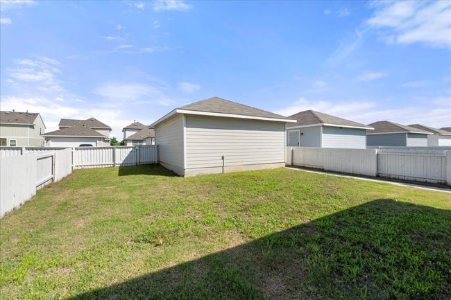 View of yard featuring a fenced backyard | Image 31