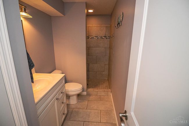 Lower Level full bath with ceramic walk-in shower. | Image 32